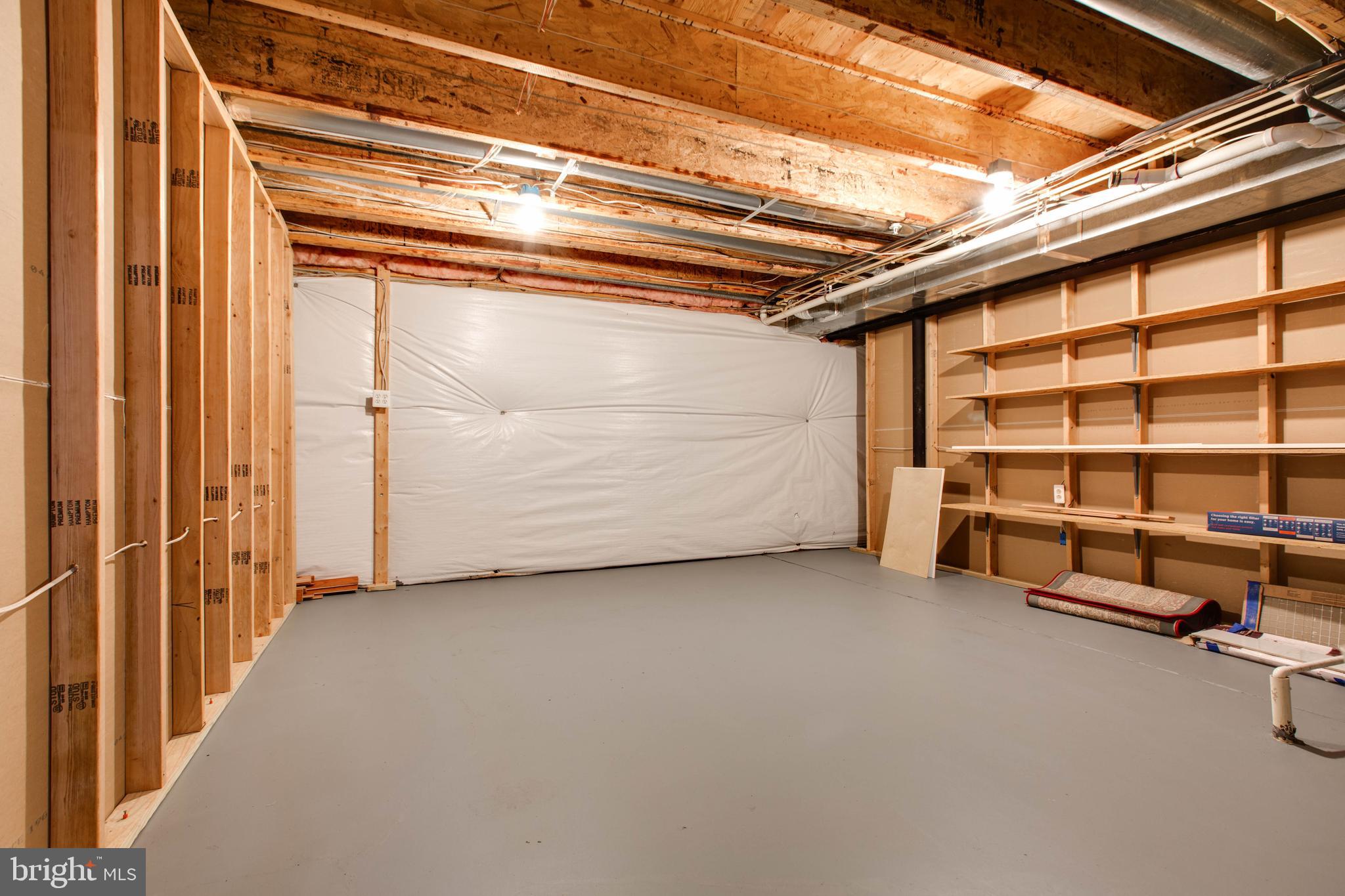 2610 Legends Way Ellicott City, MD 21042 - Photo 48 of 53 a view of a room with wooden floor and windows