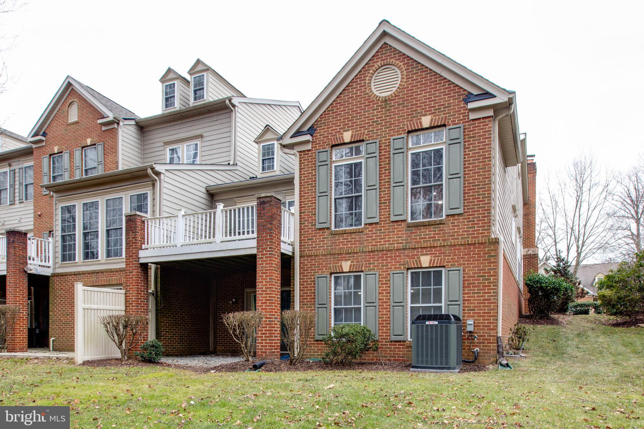 2610 Legends Way Ellicott City, MD 21042 - Photo 51 of 53 a front view of a house with a yard