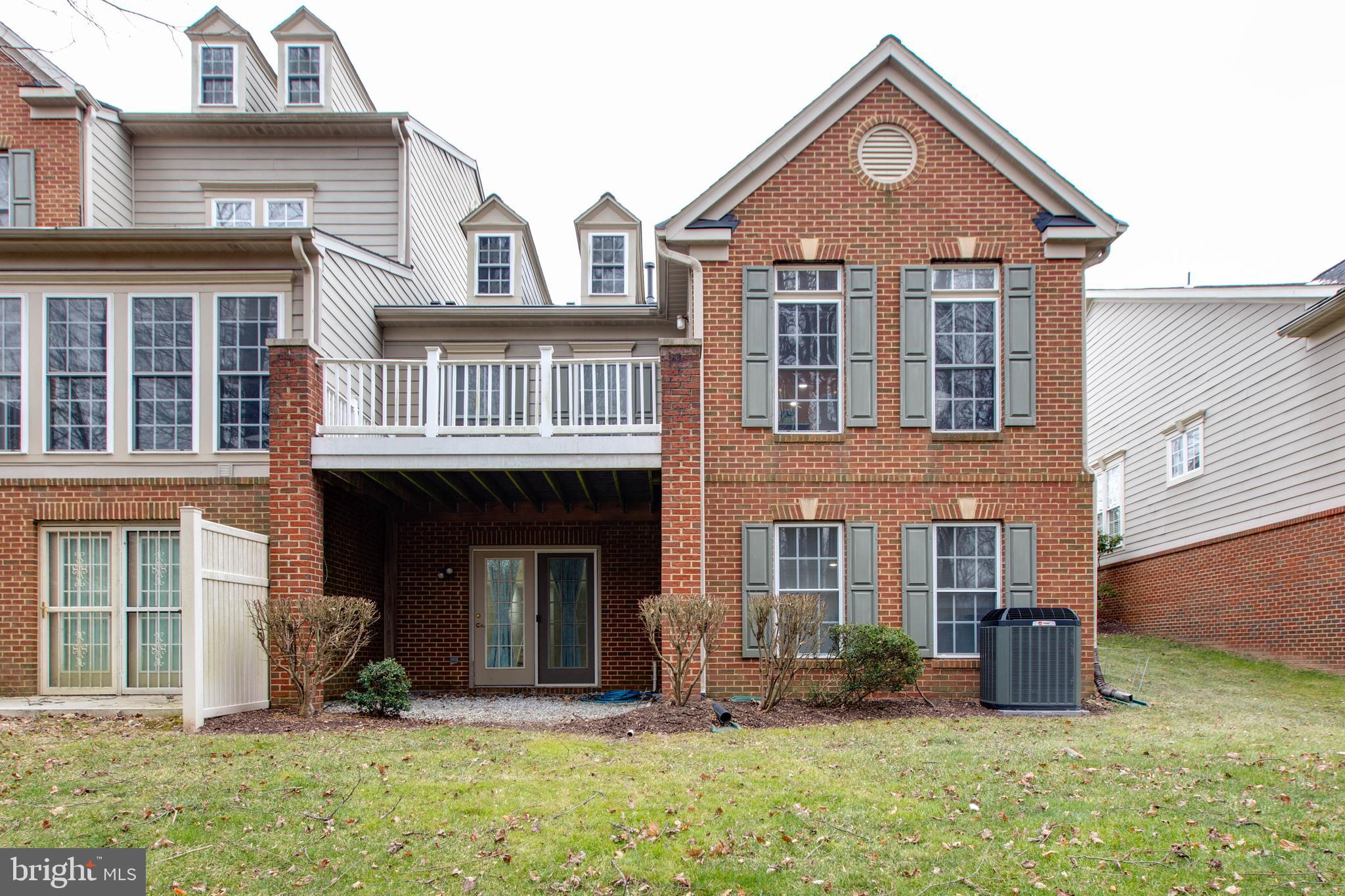 2610 Legends Way Ellicott City, MD 21042 - Photo 52 of 53 front view of a house with a yard