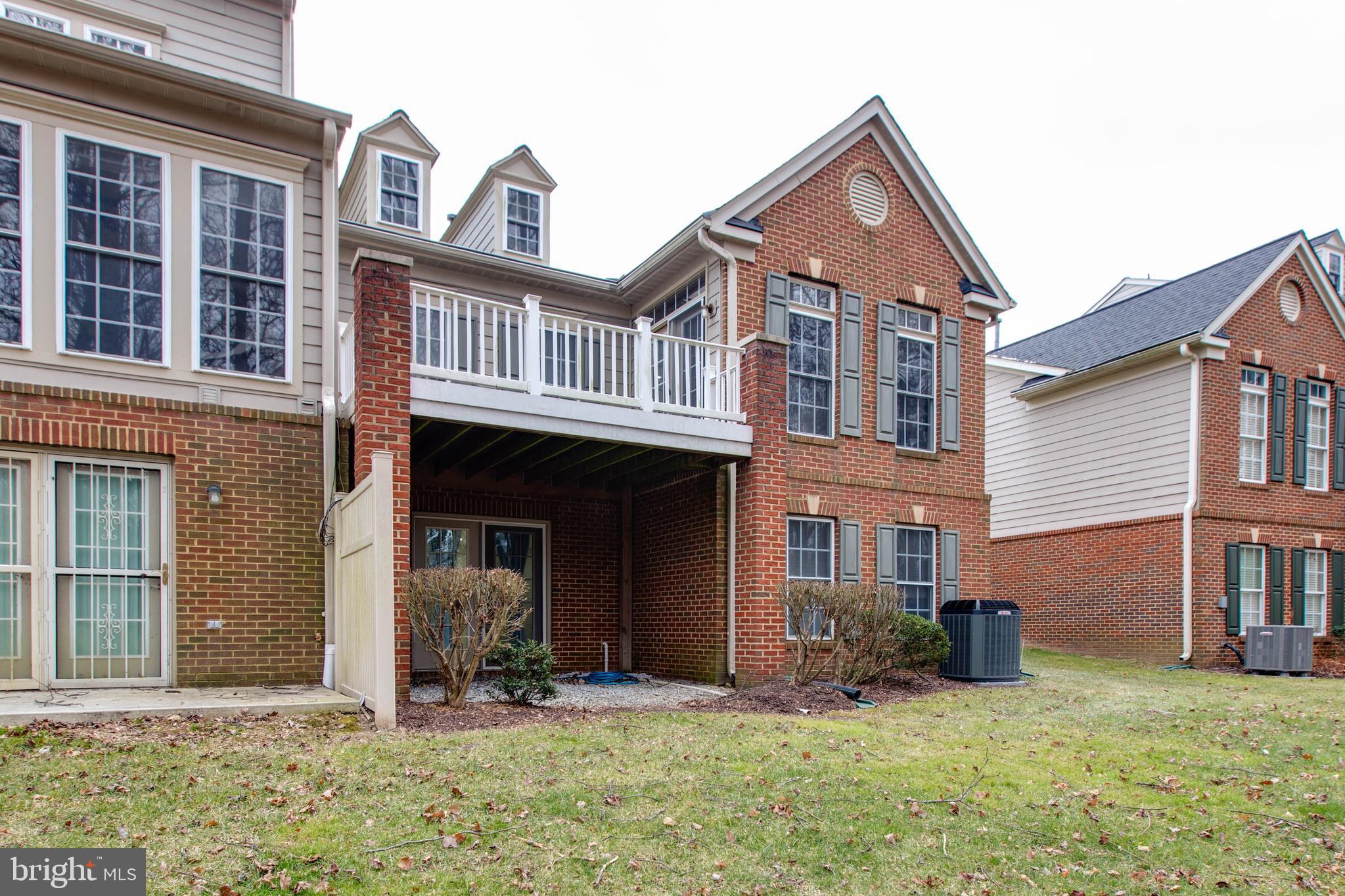 2610 Legends Way Ellicott City, MD 21042 - Photo 53 of 53 a front view of a house with a yard