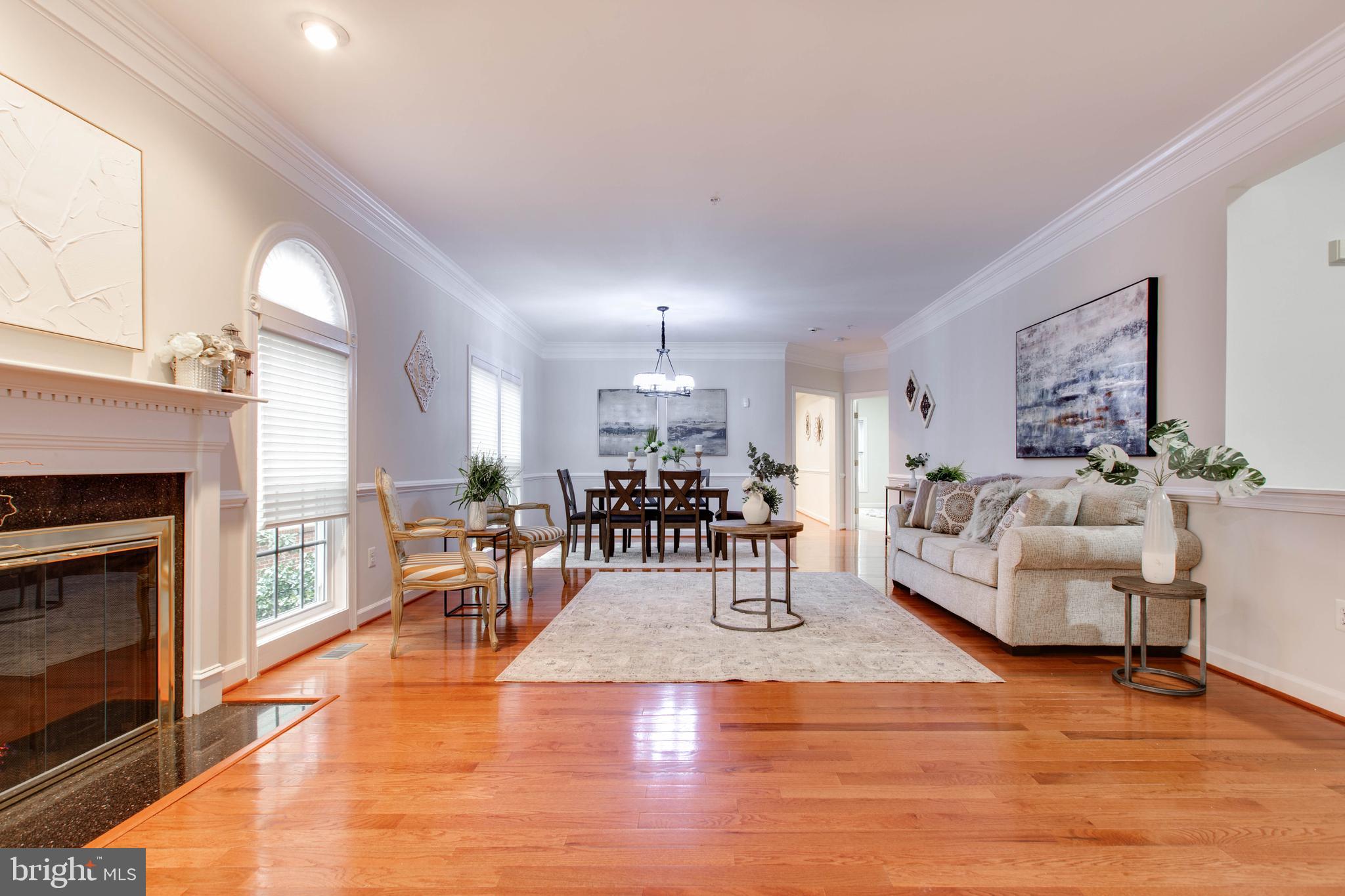 2610 Legends Way Ellicott City, MD 21042 - Photo 8 of 53 a living room with furniture and a fireplace