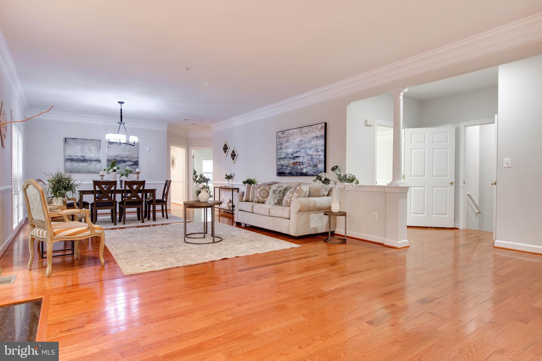 2610 Legends Way Ellicott City, MD 21042 - Photo 9 of 53 a living room with furniture and a wooden floor