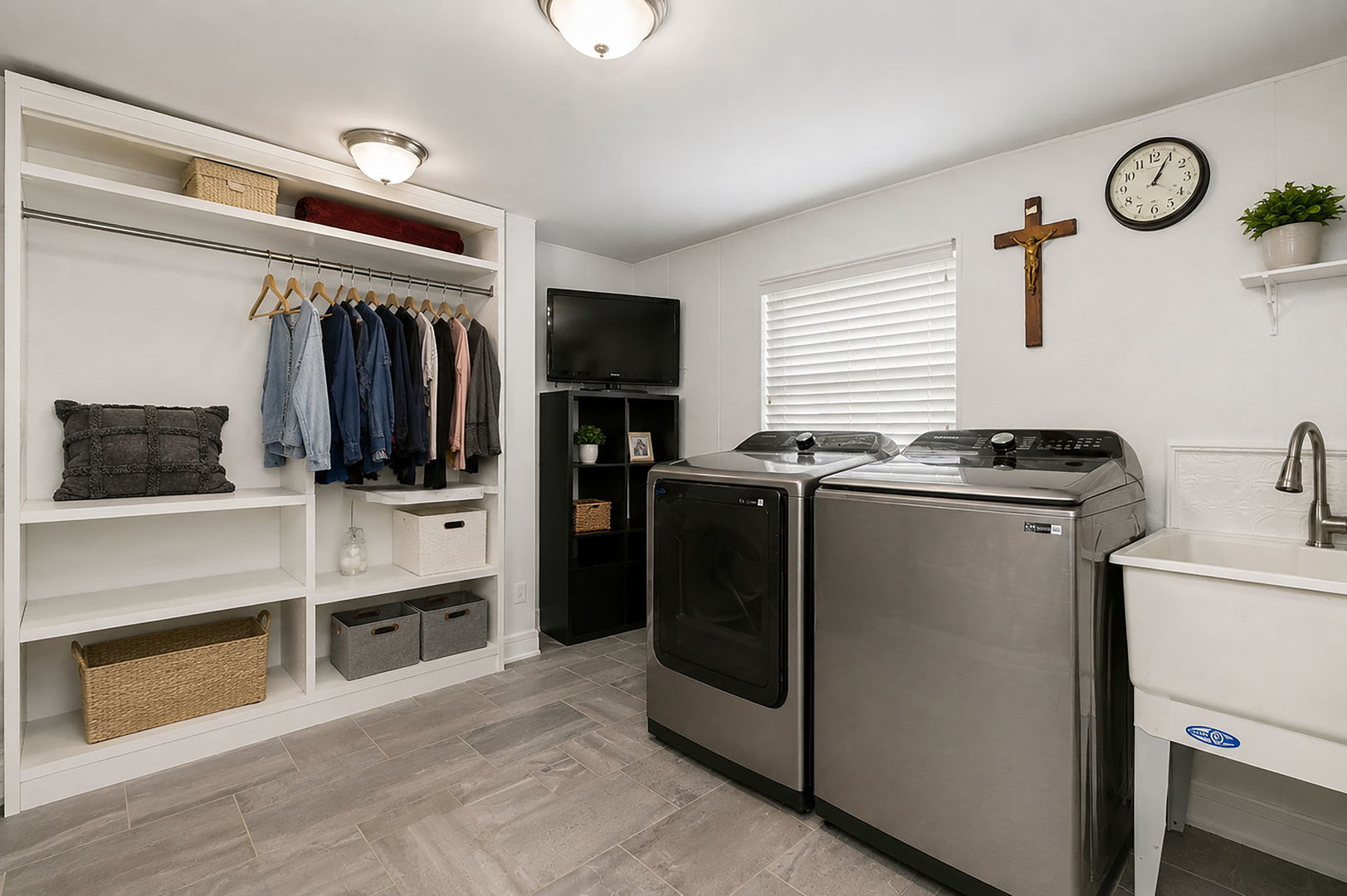 115 Rose Avenue Addison, IL 60101 - Photo 15 of 28 a view of walk in closet with clothes and shoes