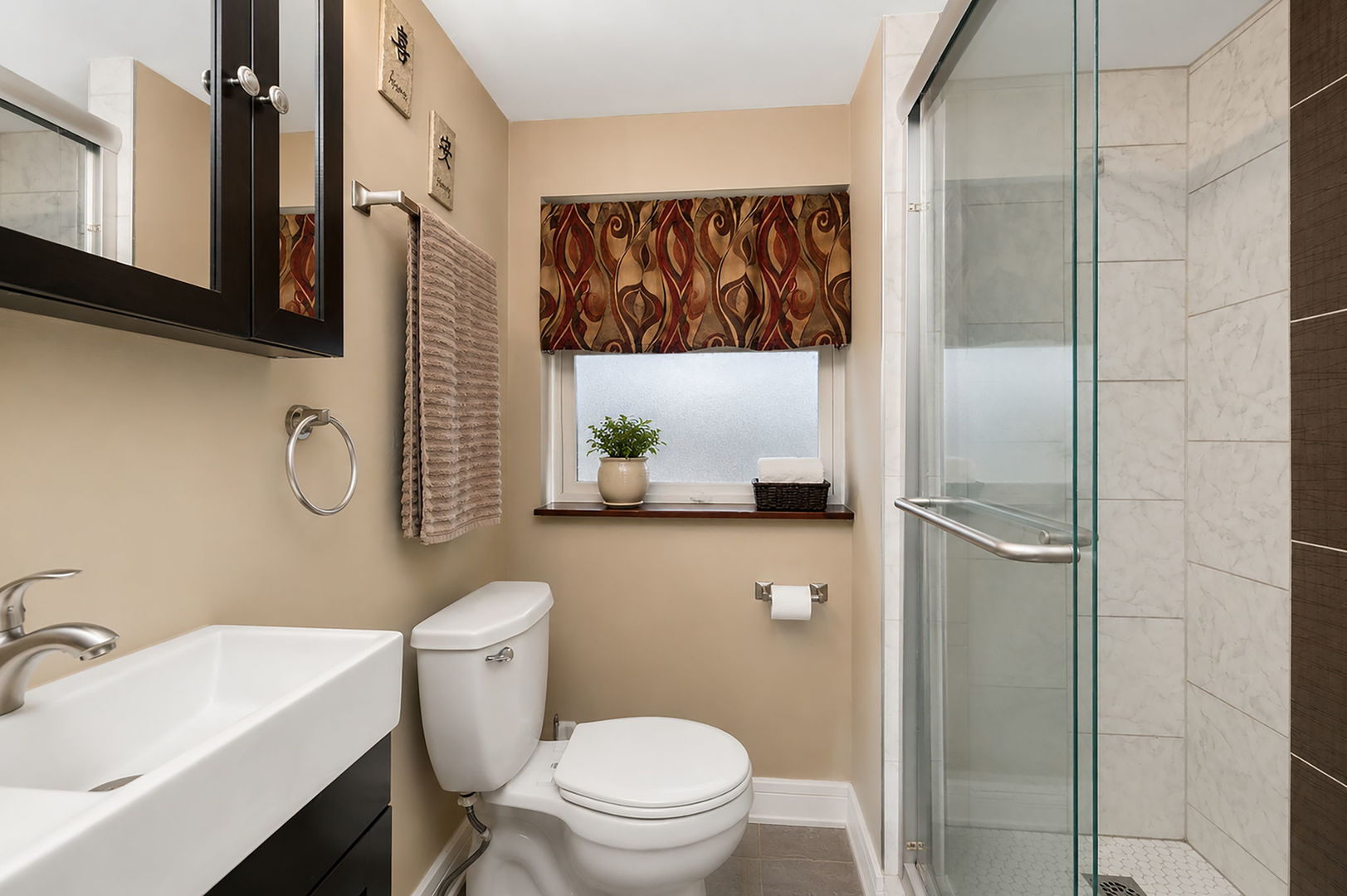 115 Rose Avenue Addison, IL 60101 - Photo 16 of 28 a bathroom with a toilet sink vanity tub and mirror