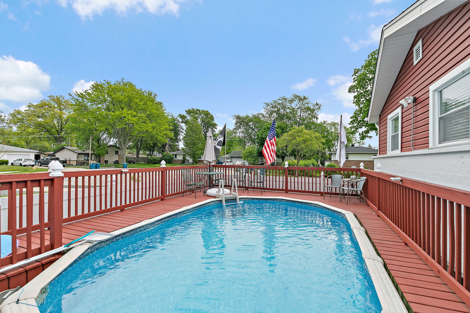115 Rose Avenue Addison, IL 60101 - Photo 20 of 28 a view of a swimming pool with a patio and a yard