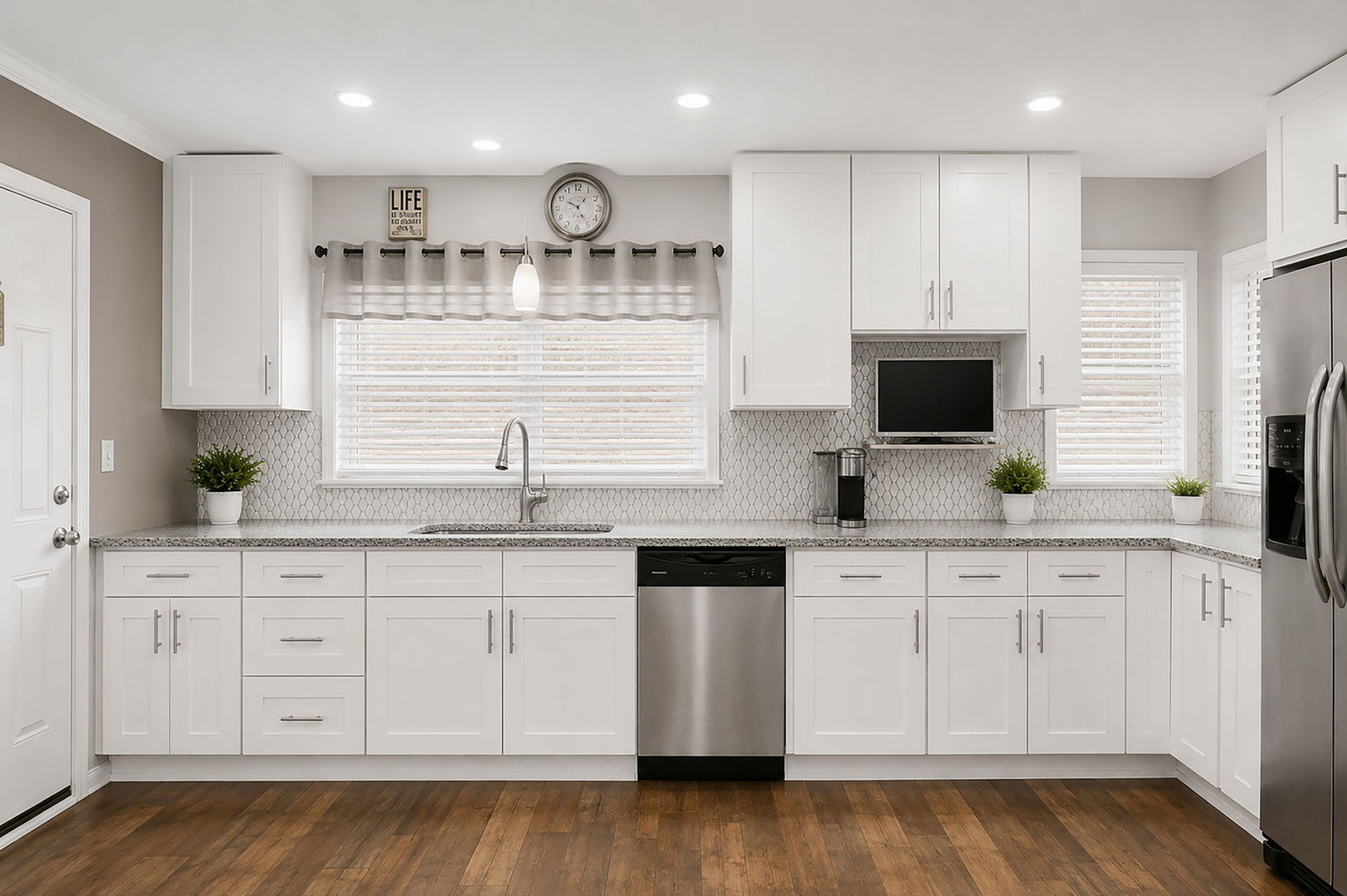 115 Rose Avenue Addison, IL 60101 - Photo 3 of 28 a kitchen with white cabinets and sink