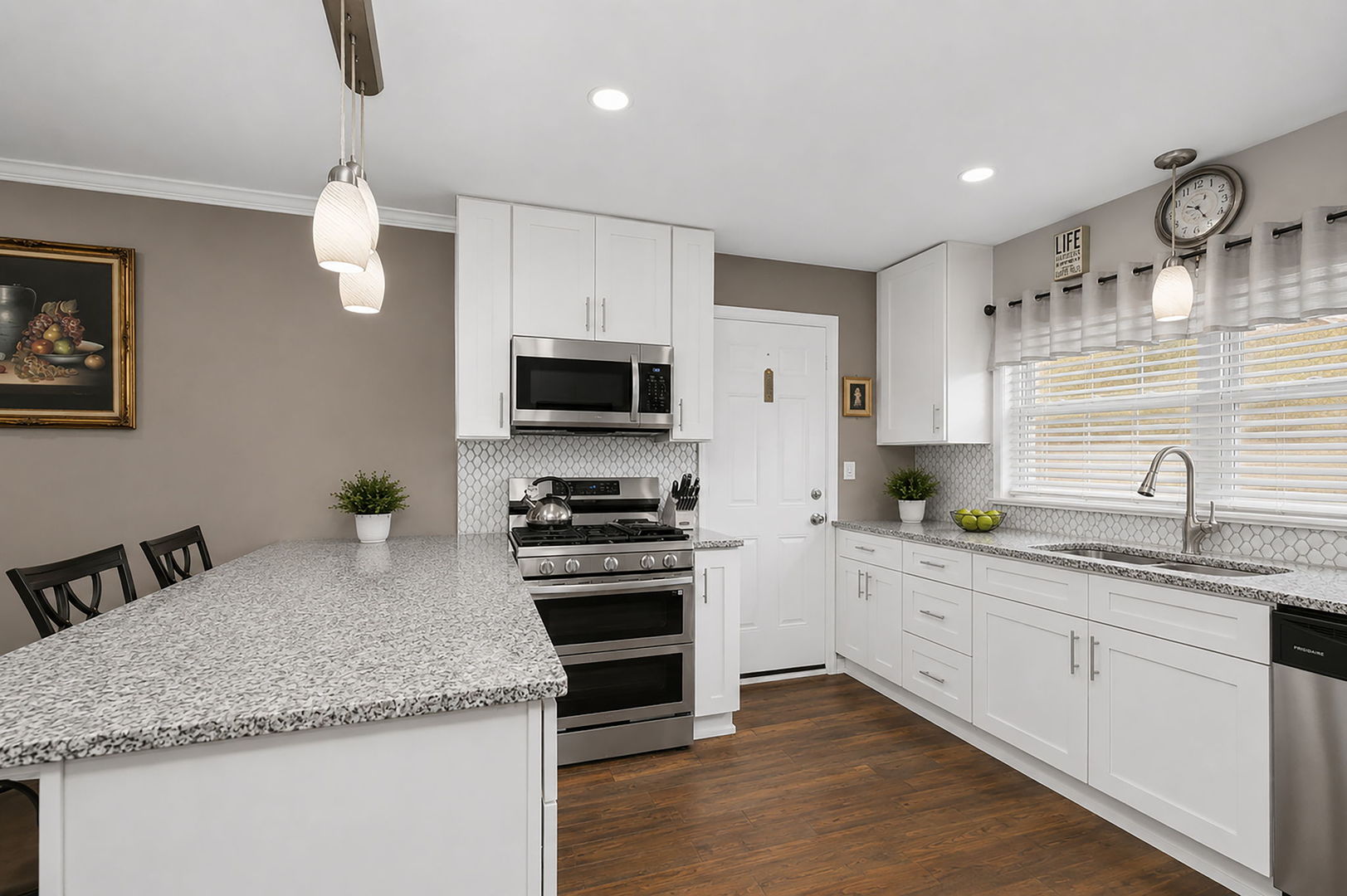 115 Rose Avenue Addison, IL 60101 - Photo 4 of 28 a kitchen with stainless steel appliances granite countertop a sink a stove top oven a counter space and cabinets