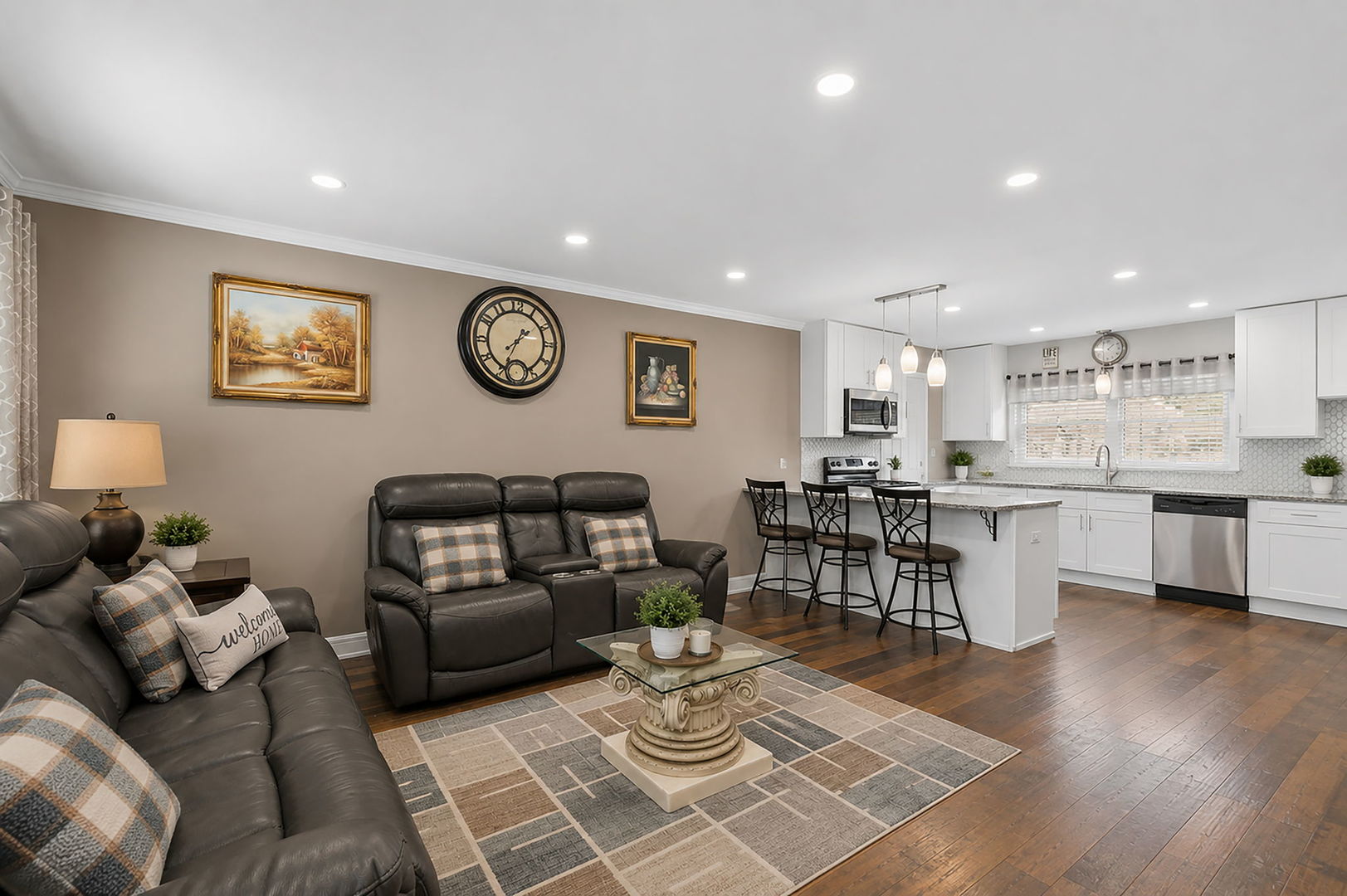 115 Rose Avenue Addison, IL 60101 - Photo 6 of 28 a living room with furniture and kitchen view