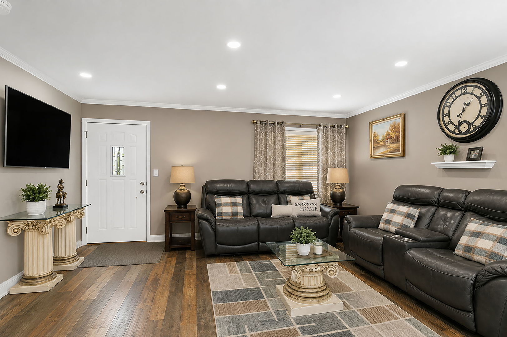 115 Rose Avenue Addison, IL 60101 - Photo 7 of 28 a living room with furniture a flat screen tv and a window