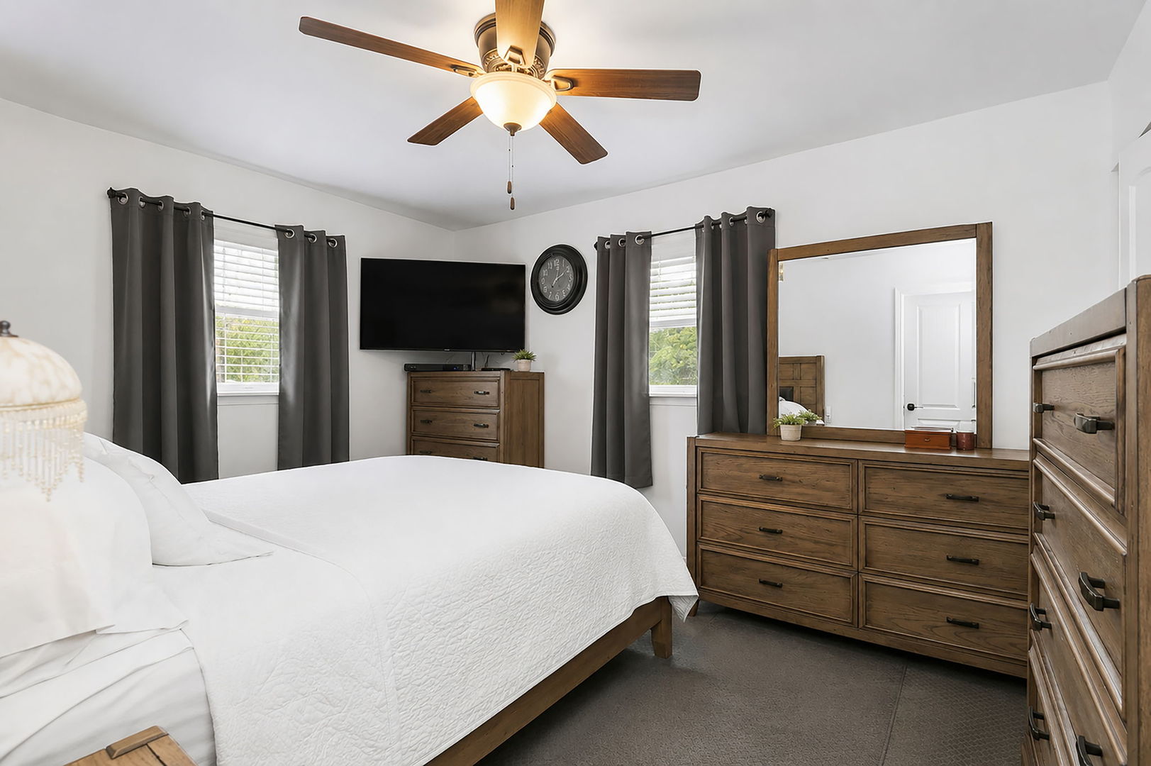 115 Rose Avenue Addison, IL 60101 - Photo 8 of 28 a bedroom with a bed dresser and a flat tv screen