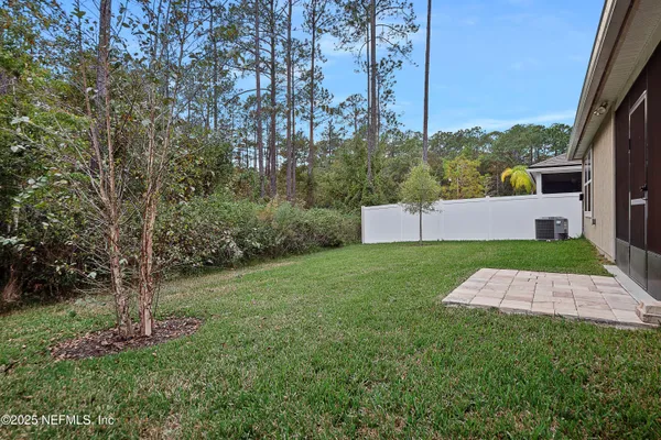 a view of yard with tree s