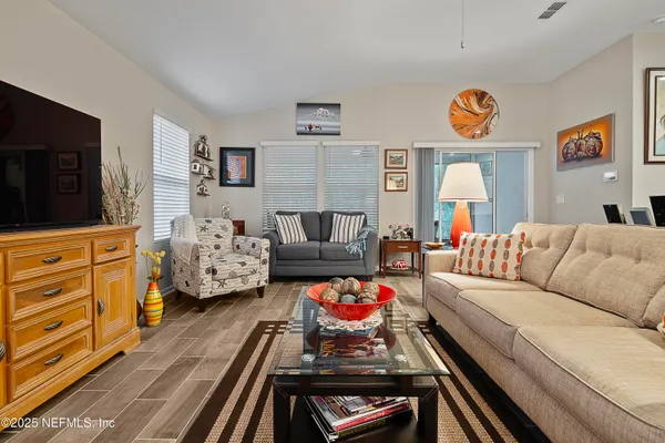 a bedroom with furniture and a couch