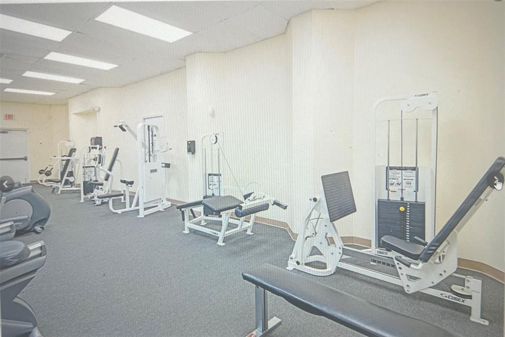 3140 Holiday Springs Boulevard, Unit 109 Margate, FL 33063 - Photo 19 of 26 a view of a workspace with furniture