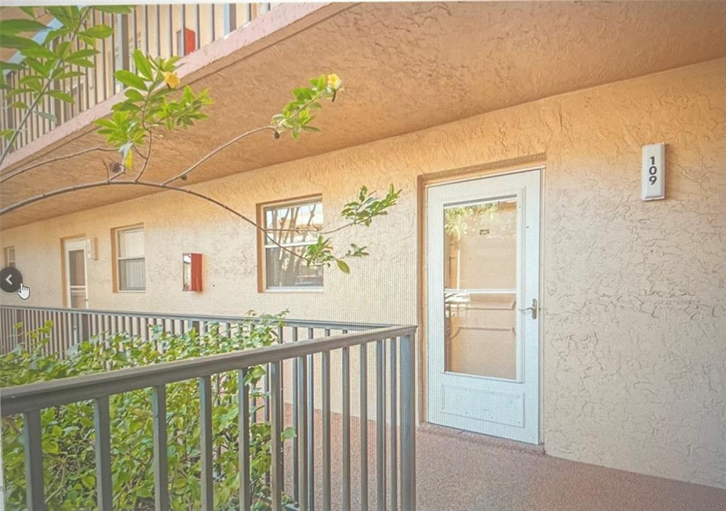 3140 Holiday Springs Boulevard, Unit 109 Margate, FL 33063 - Photo 2 of 26 a view of a balcony