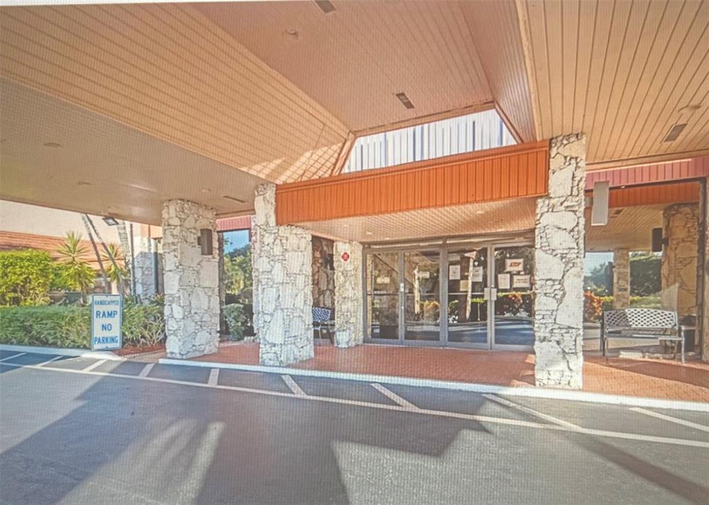 3140 Holiday Springs Boulevard, Unit 109 Margate, FL 33063 - Photo 25 of 26 a view of a building from a balcony