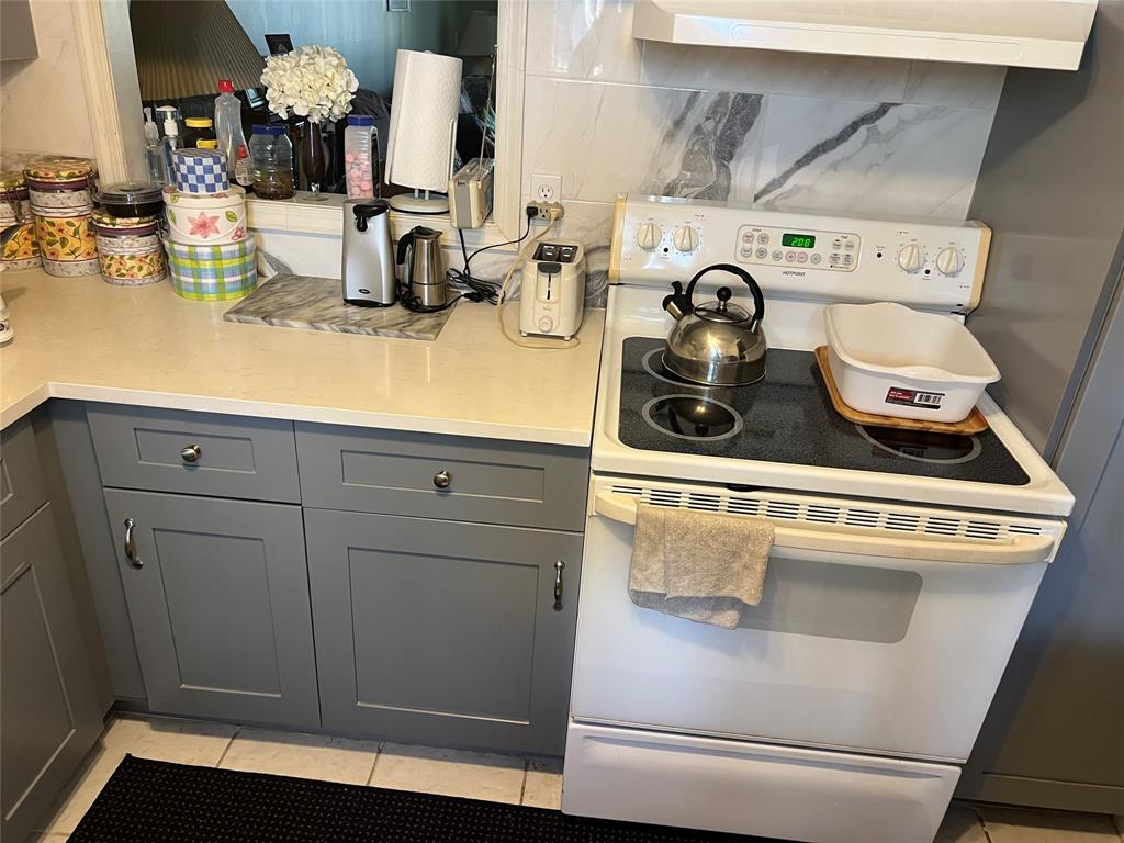 3140 Holiday Springs Boulevard, Unit 109 Margate, FL 33063 - Photo 10 of 26 a close view of sink and washer dryer