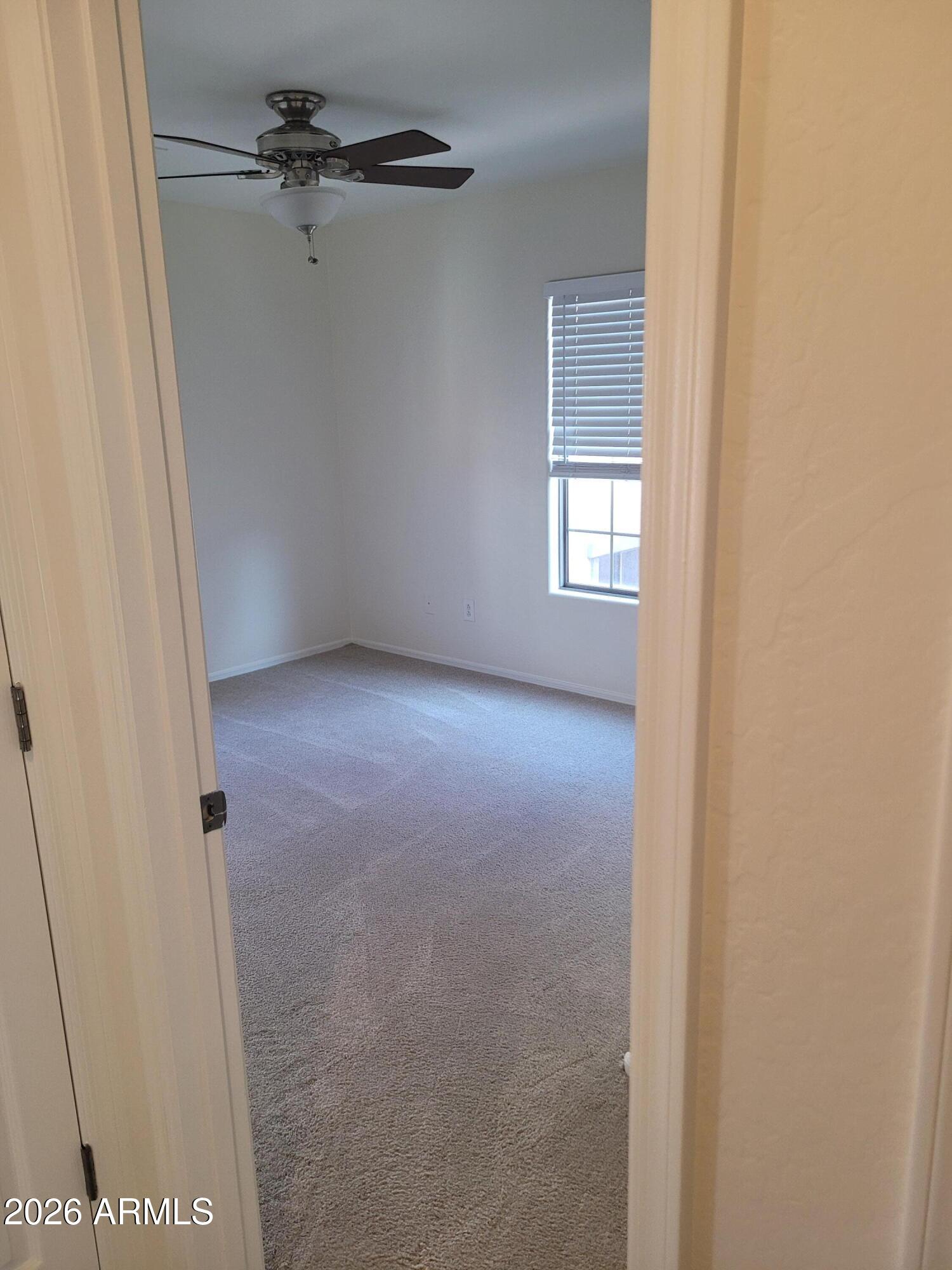 1453 South Sinova Avenue Gilbert, AZ 85296 - Photo 27 of 46 a view of a hallway