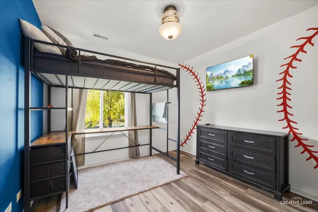 a view of a livingroom with furniture and a window