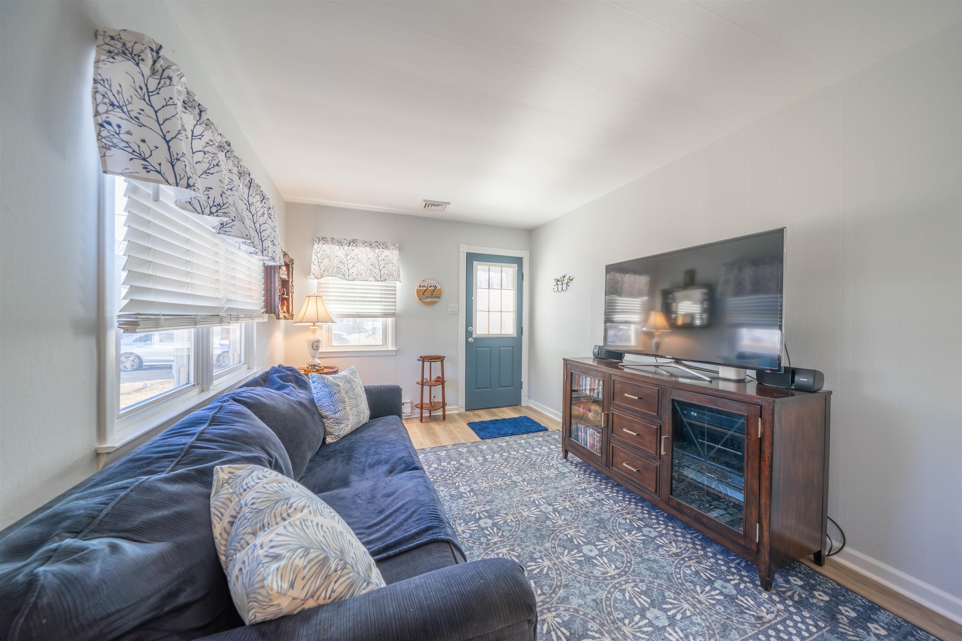 50 Vacation Villas, NJ 08251 - Photo 13 of 21 a living room with furniture and a fireplace