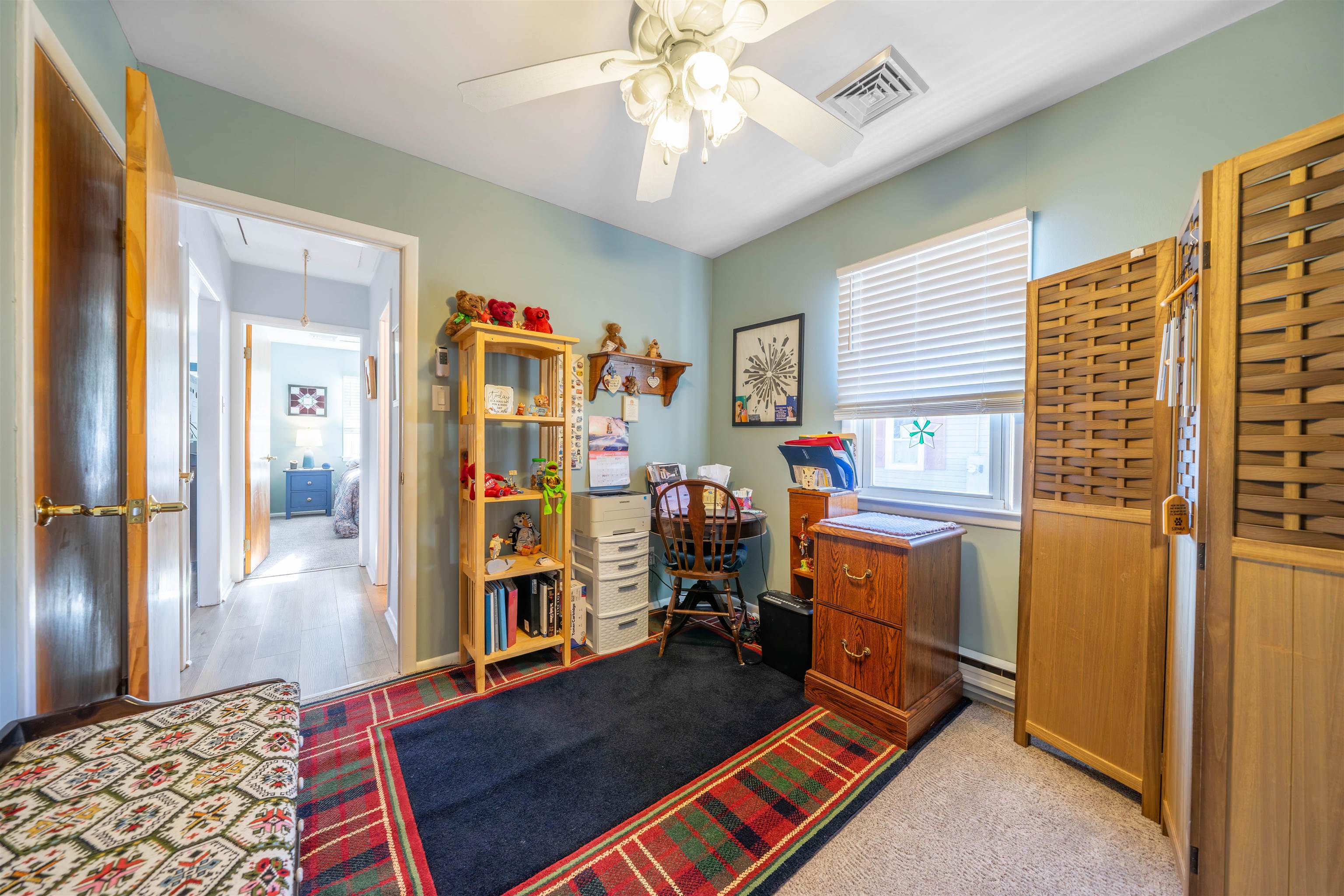 50 Vacation Villas, NJ 08251 - Photo 3 of 21 a room with furniture and a window