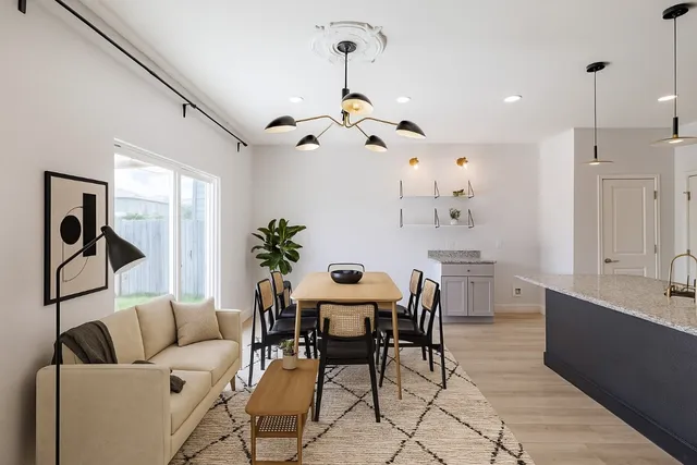 a view of a livingroom with furniture and furniture