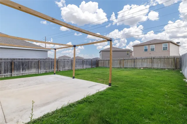 a view of a backyard with a garden