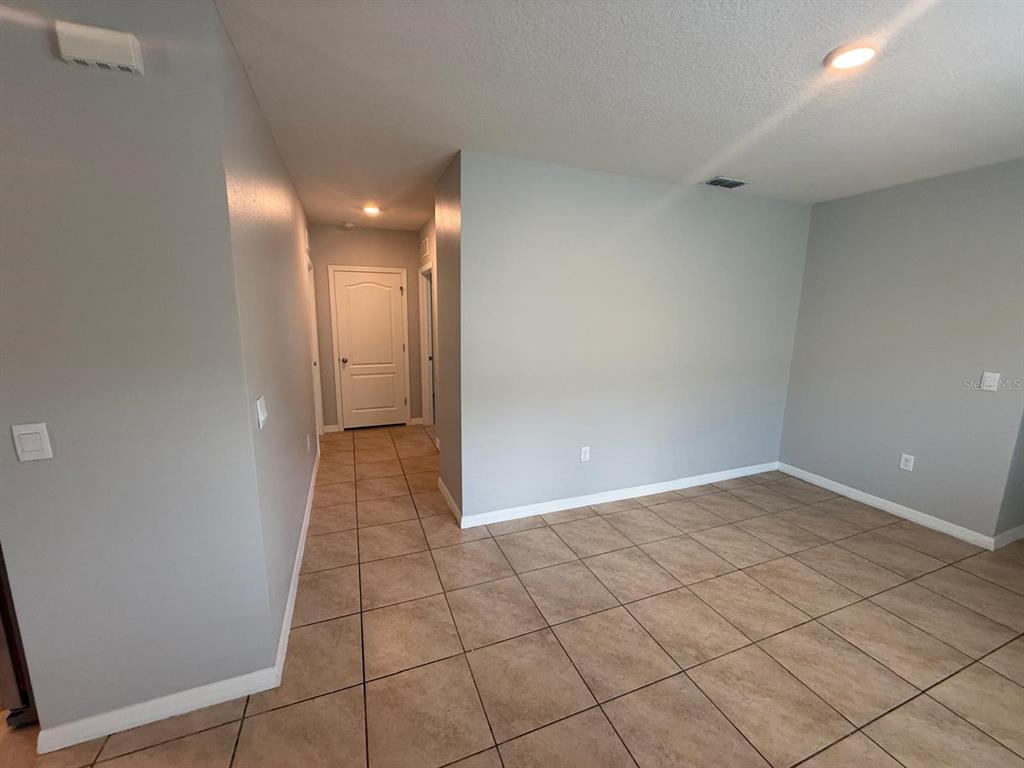 754 Chinoy Road Davenport, FL 33837 - Photo 23 of 26 a view of a hallway