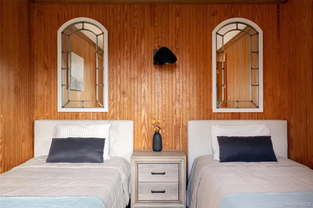 a view of balcony with wooden wall