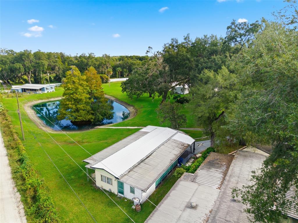 6147 Ridgewood Drive Zephyrhills, FL 33542 - Photo 21 of 21 a view of a garden with an outdoor space
