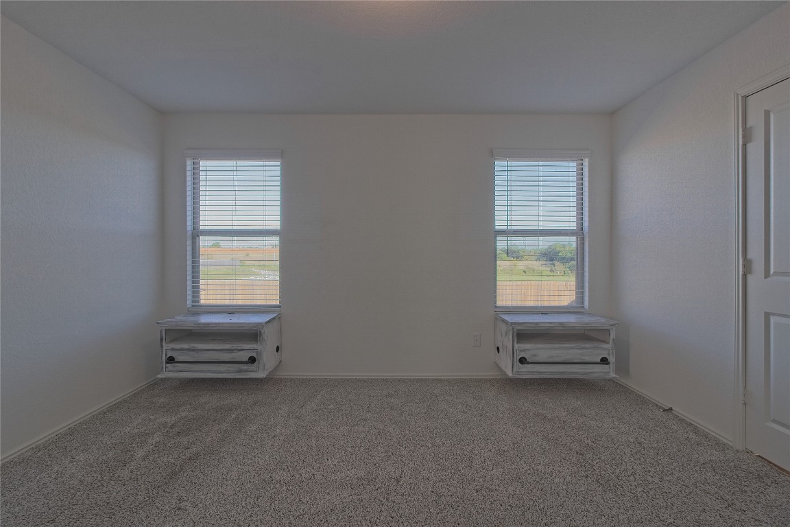 505 Greatest Gift Way Jarrell, TX 76537 - Photo 15 of 30 an empty room with windows