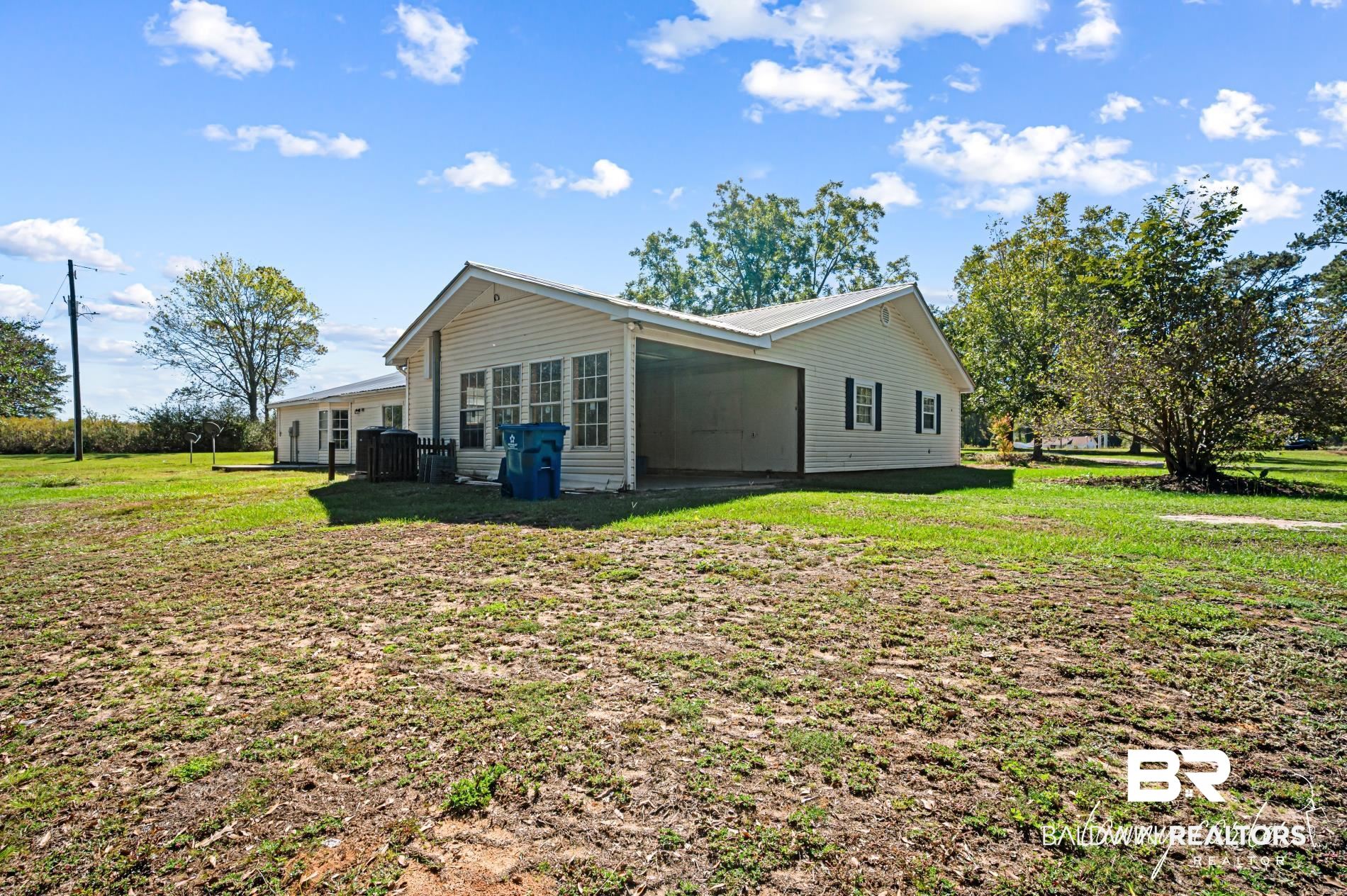 3086 Wild Fork Road Frisco City, AL 36445 - Photo 27 of 30 Back of property with a yard