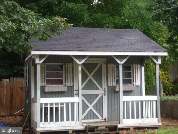 5007 Decatur Street St. Leonard, MD 20685 - Photo 2 of 17 a view of house with porch