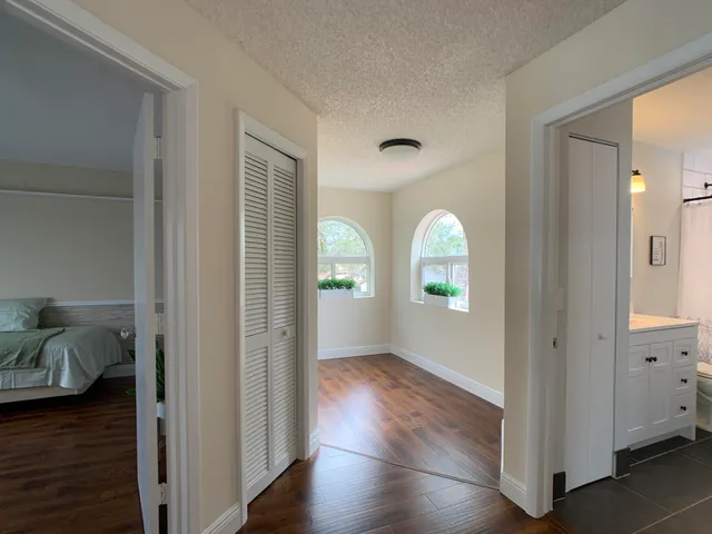 a view of entryway with wooden floor