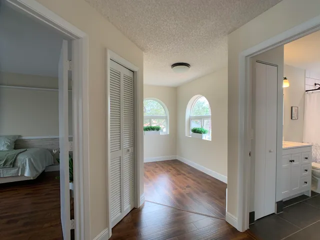 a view of entryway with wooden floor