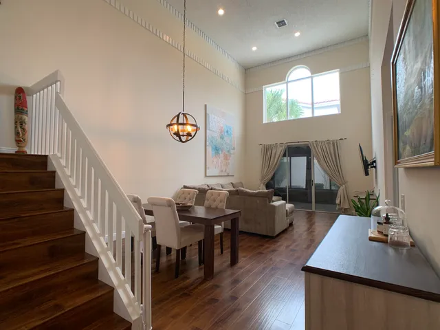 a room with furniture and a wooden floor