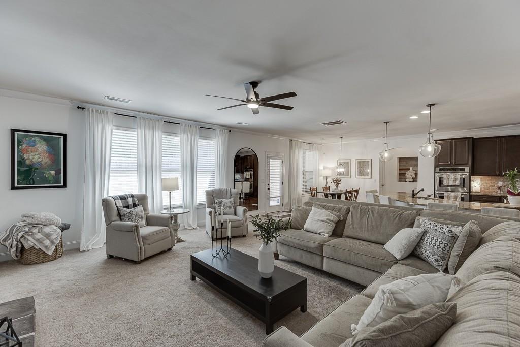 2906 Jones Phillips Road Dacula, GA 30019 - Photo 12 of 53 a living room with furniture kitchen view and a window