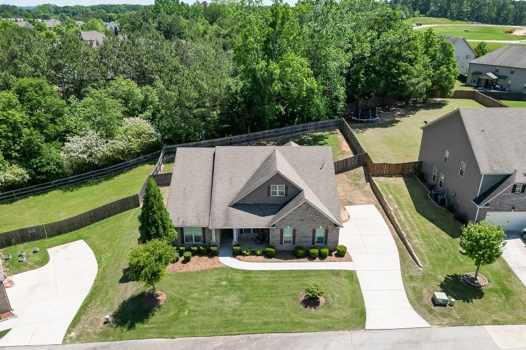 2906 Jones Phillips Road Dacula, GA 30019 - Photo 49 of 53 an aerial view of a house with swimming pool garden and patio