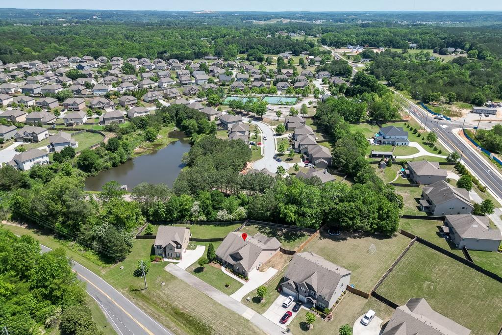 2906 Jones Phillips Road Dacula, GA 30019 - Photo 52 of 53 an aerial view of a house with a yard