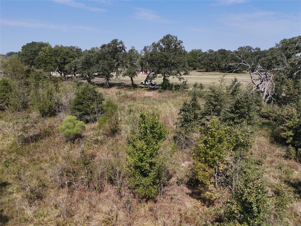 13 Highway 37 Talco, TX 75487 - Photo 7 of 14 a view of a lake with houses in the back