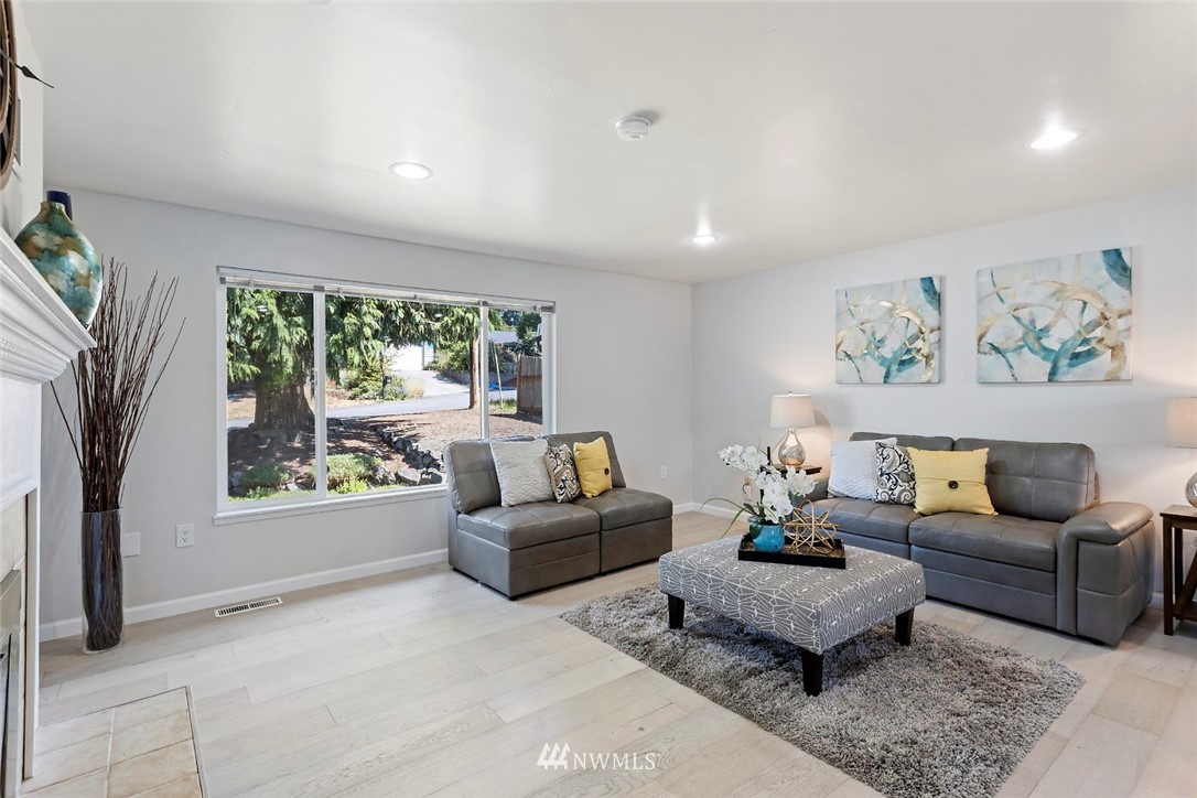 6609 Southeast 4th Place Renton, WA 98059 - Photo 3 of 26 a living room with furniture and a large window