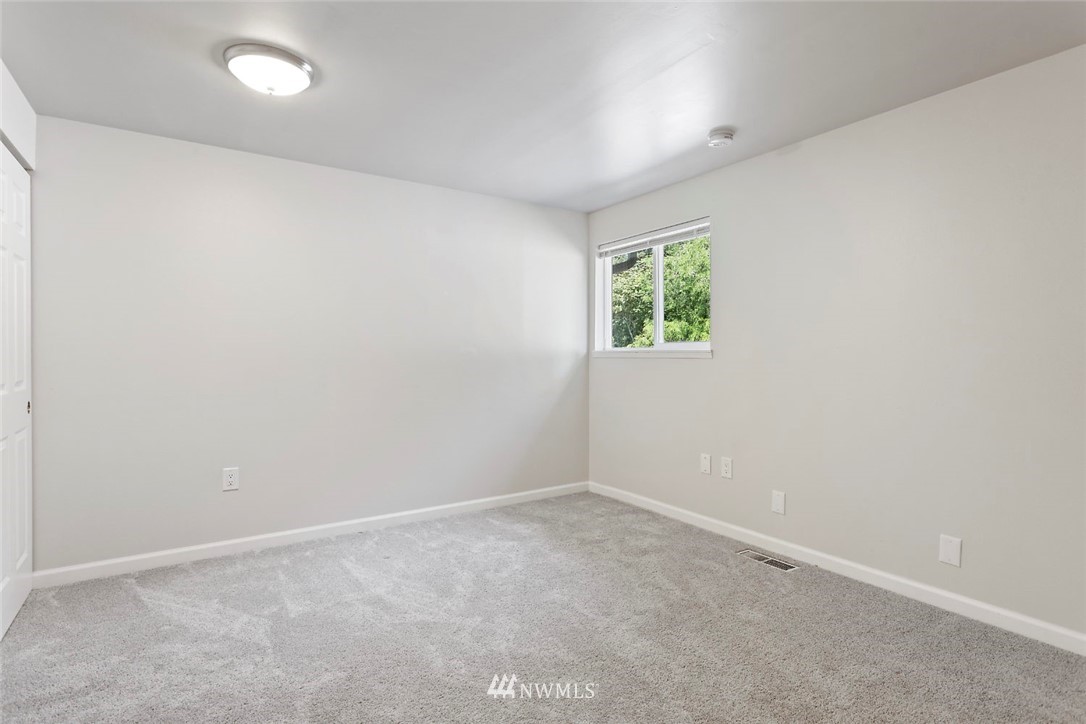 6609 Southeast 4th Place Renton, WA 98059 - Photo 21 of 26 an empty room with windows