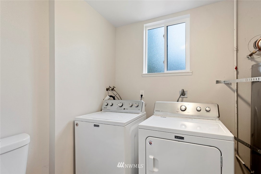 6609 Southeast 4th Place Renton, WA 98059 - Photo 23 of 26 a utility room with dryer and washer
