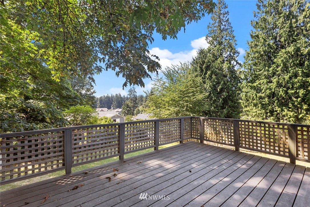 6609 Southeast 4th Place Renton, WA 98059 - Photo 24 of 26 a view of deck with wooden floor and fence
