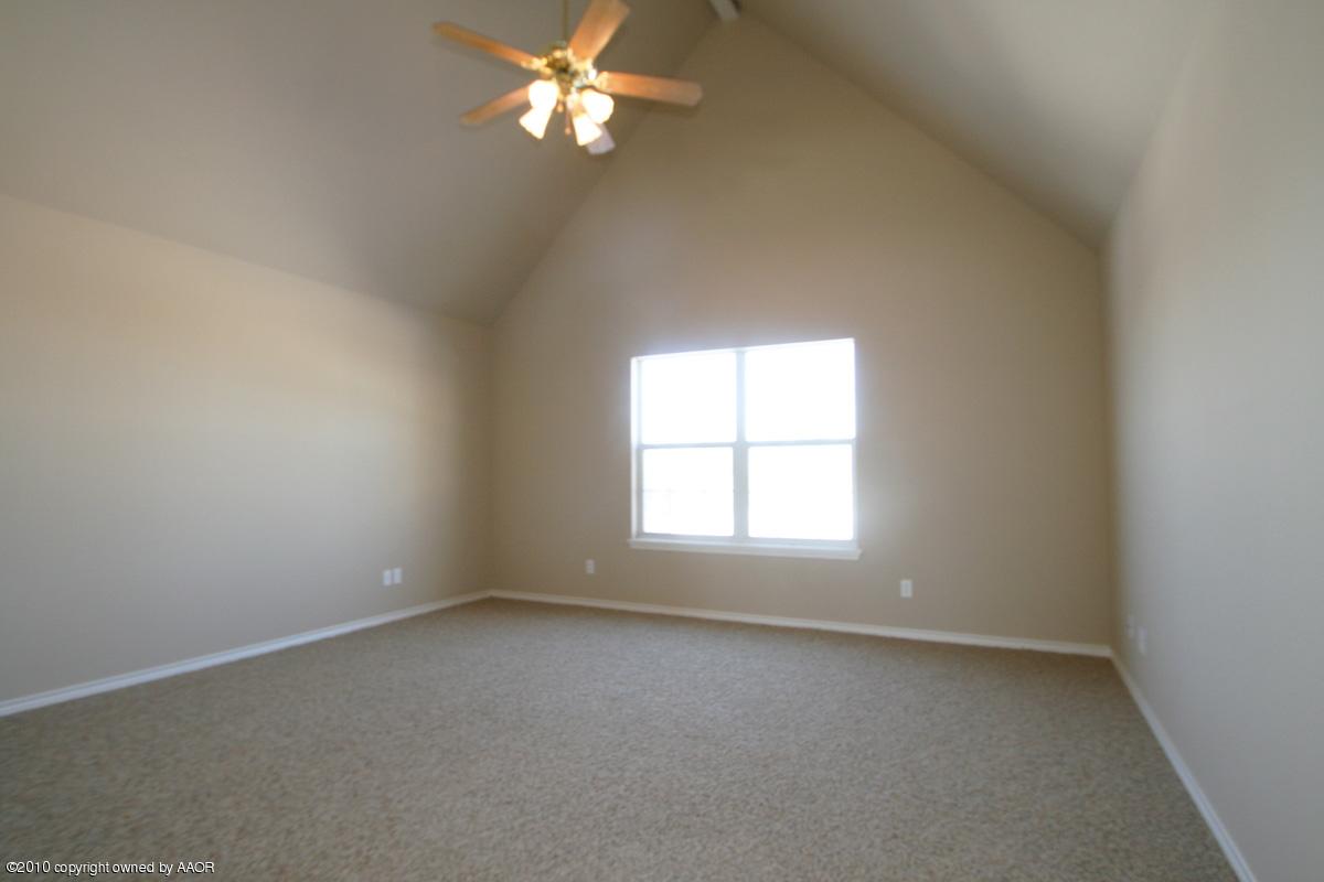 8950 Red Wing Road Amarillo, TX 79119 - Photo 17 of 29 an empty room with a window