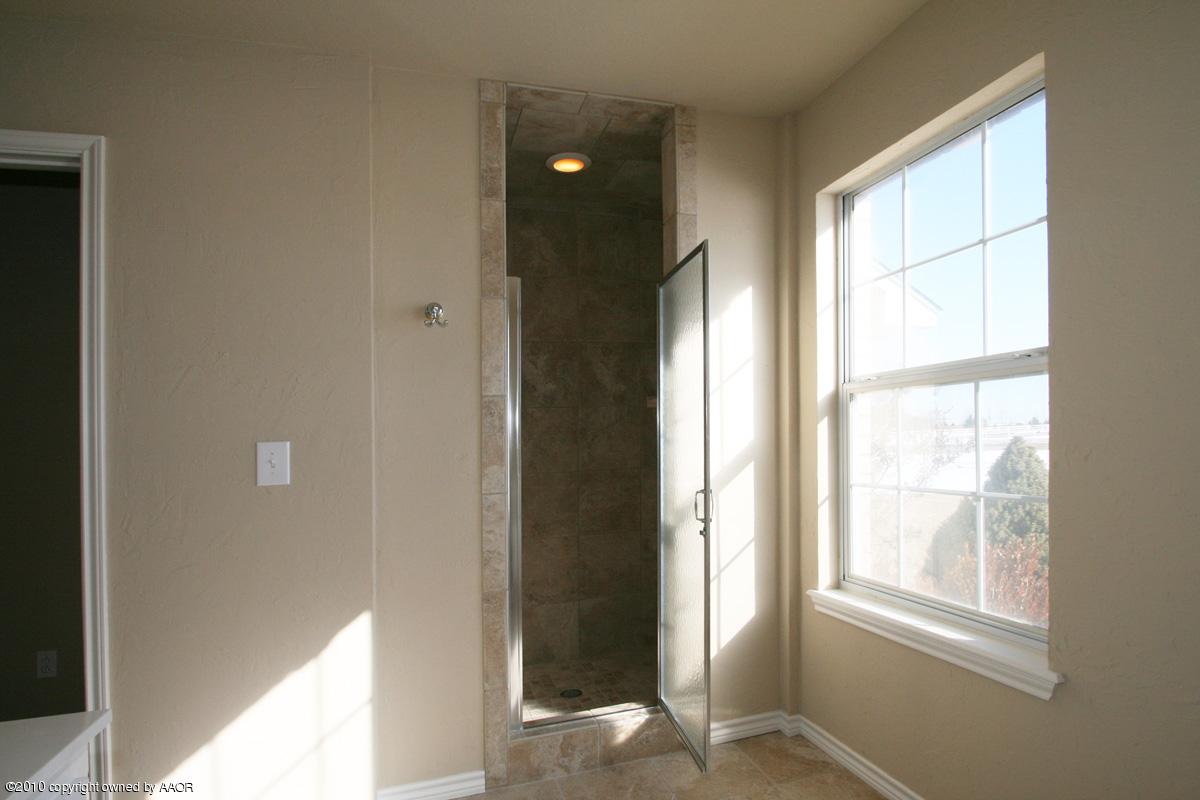 8950 Red Wing Road Amarillo, TX 79119 - Photo 18 of 29 a view of an empty room and window