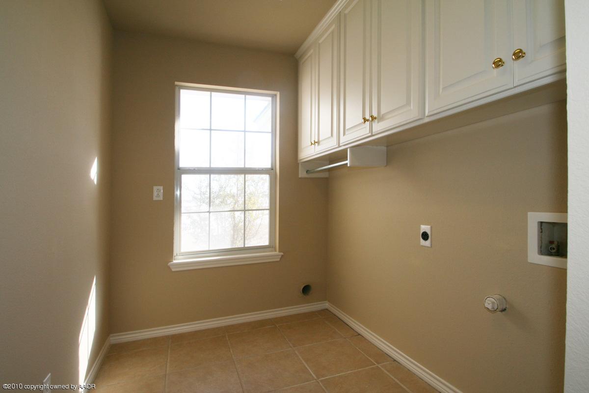 8950 Red Wing Road Amarillo, TX 79119 - Photo 24 of 29 a view of a kitchen with wooden floor and fan