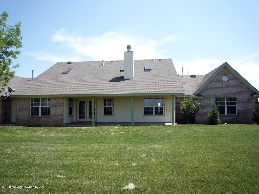 8950 Red Wing Road Amarillo, TX 79119 - Photo 27 of 29 front view of a house with a yard