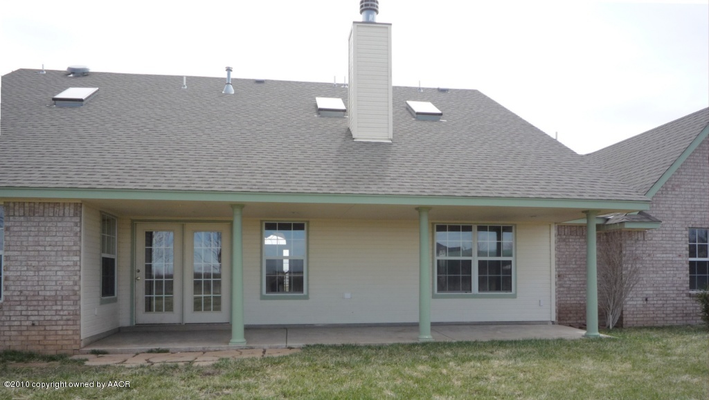 8950 Red Wing Road Amarillo, TX 79119 - Photo 28 of 29 a front view of a house with a yard