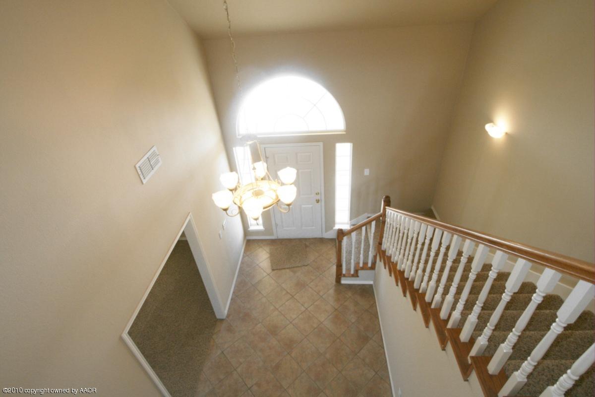 8950 Red Wing Road Amarillo, TX 79119 - Photo 5 of 29 a view of entryway with wooden floor