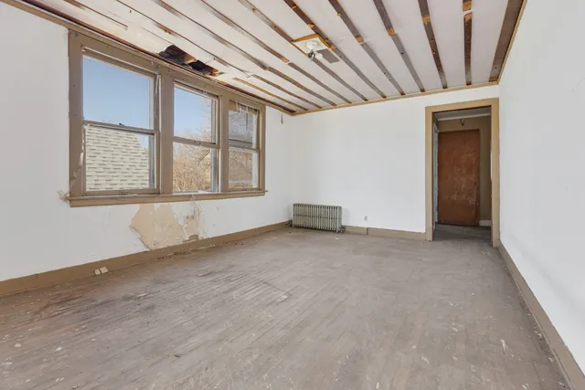 a utility room with cabinets